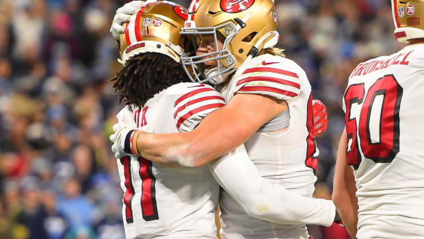 Dec 23, 2021; Nashville, Tennessee, USA; San Francisco 49ers tight end George Kittle (85) celebrates the touchdown catch of wide receiver Brandon Aiyuk (11) against the Tennessee Titans during the first half at Nissan Stadium. Mandatory Credit: Steve Roberts-USA TODAY Sports